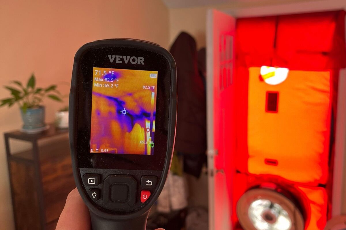 Infrared thermal image showing air leaks around a window and wall in a Maine home