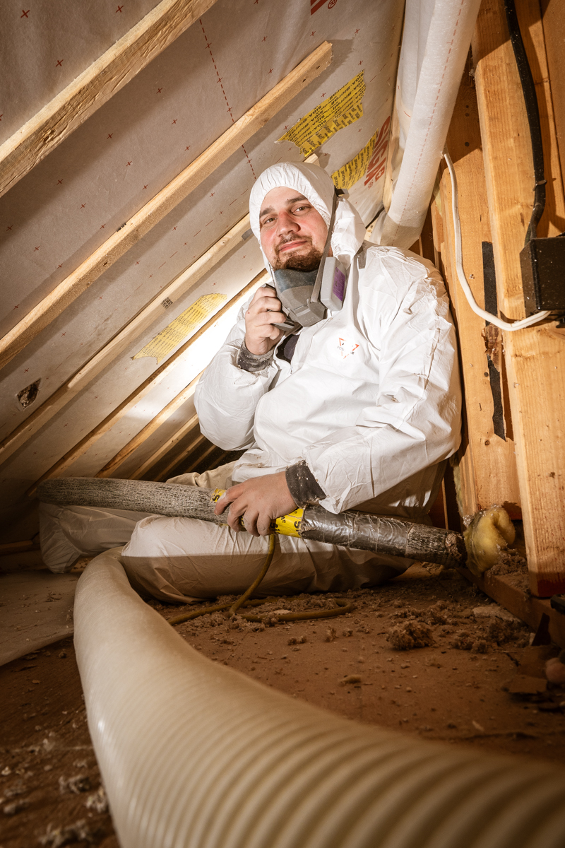 Energy recovery ventilator unit installed in a Maine home with ductwork for fresh air supply